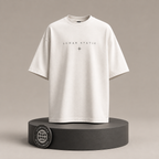 Lunar Static white T-shirt front on round Signature Essentials pedestal